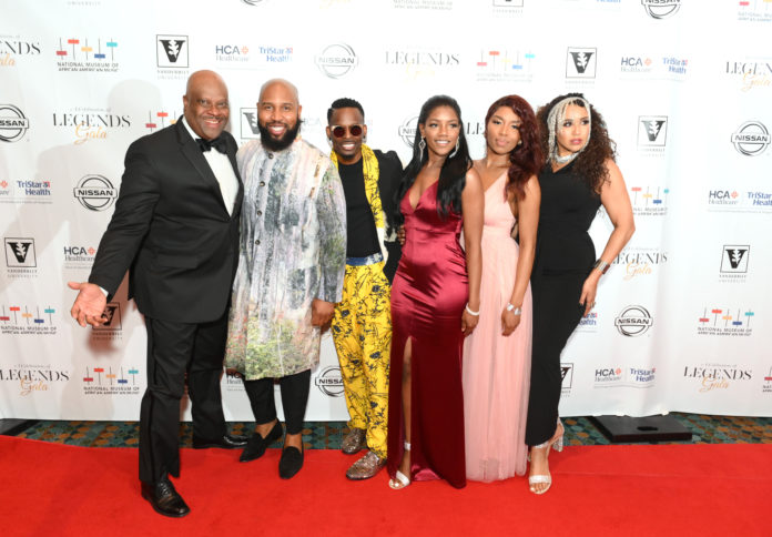 The Celebration of Legends Gala 2019 NASHVILLE, TENNESSEE - JUNE 27: H. Beecher Hicks III and Claude Kelly and Chuck Harmony of the group Louis York attend The Celebration of Legends Gala 2019 at Music City Center on June 27, 2019 in Nashville, Tennessee. (Photo by Jason Kempin/Getty Images for the National Museum of African American Music)