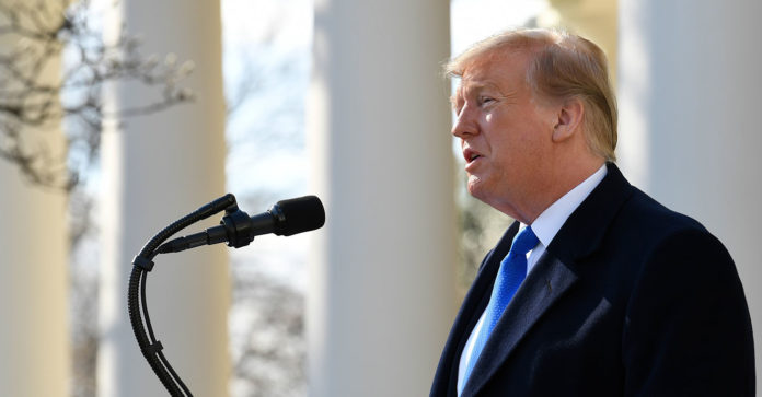DT President Donald Trump said Friday he will sign a national emergency declaration to address the situation on the southern border, while claiming that his actions are consistent with those of his predecessors. (Photo by: Susan Walsh/AP)