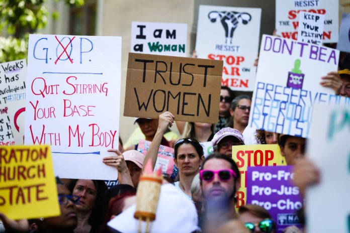 Georgia Abortion Ban Protest Top executives from more than 180 companies have a message for lawmakers: Restricting abortion is