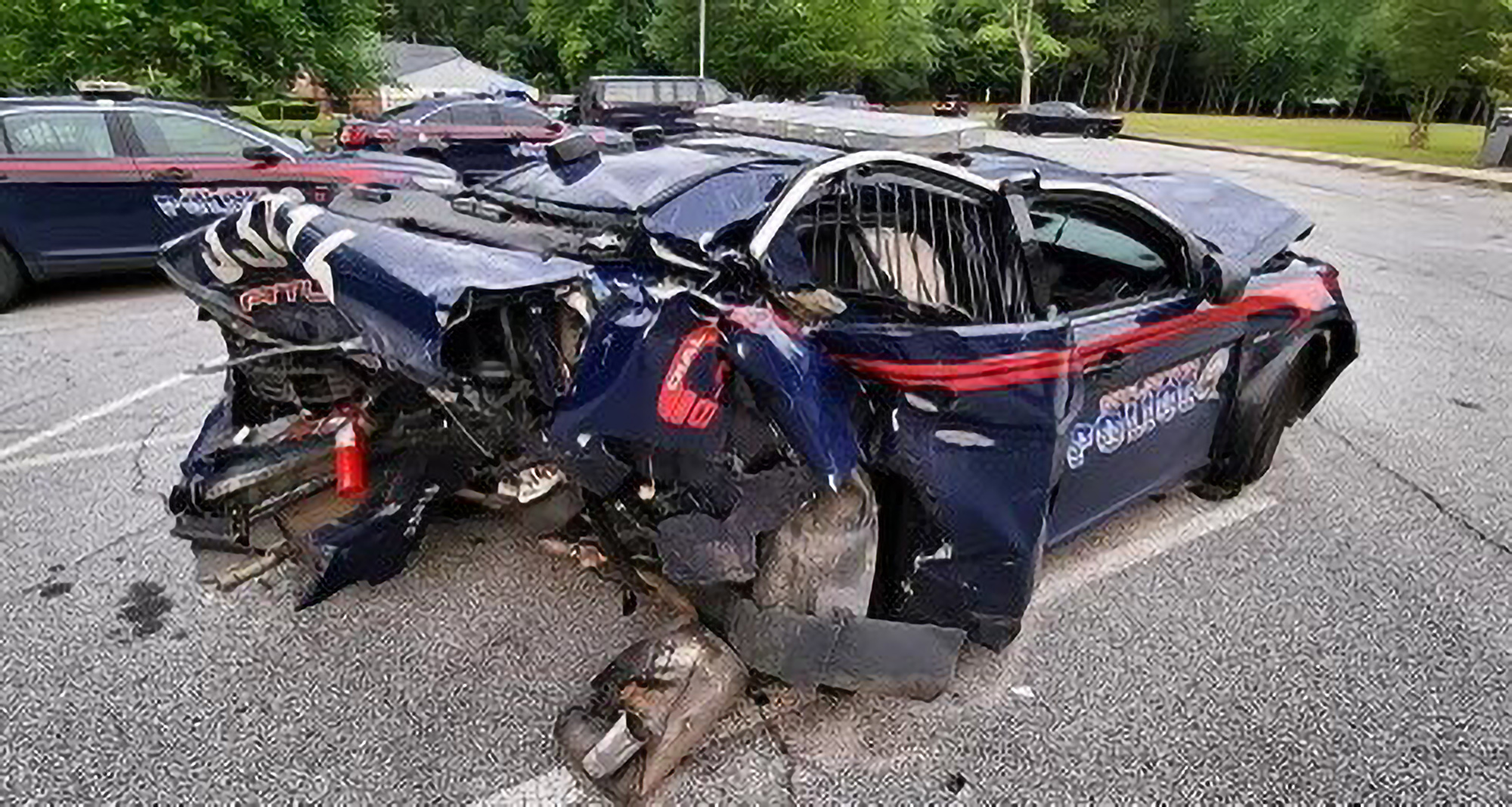 Officer Duc Vo's patrol car after it was rammed by an alleged drunk driver on May 5. The patrol car then hit Vo, who was on the roadside. He is still recovering from his injuries. (Atlanta Police Department/Zenger)