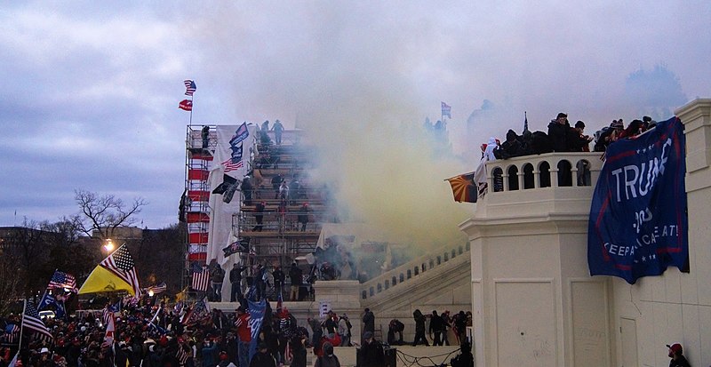 Tear gas outside the United States Capitol on 6 January 2021 (Photo by: Tyler Merbler | Wikimedia Commons)