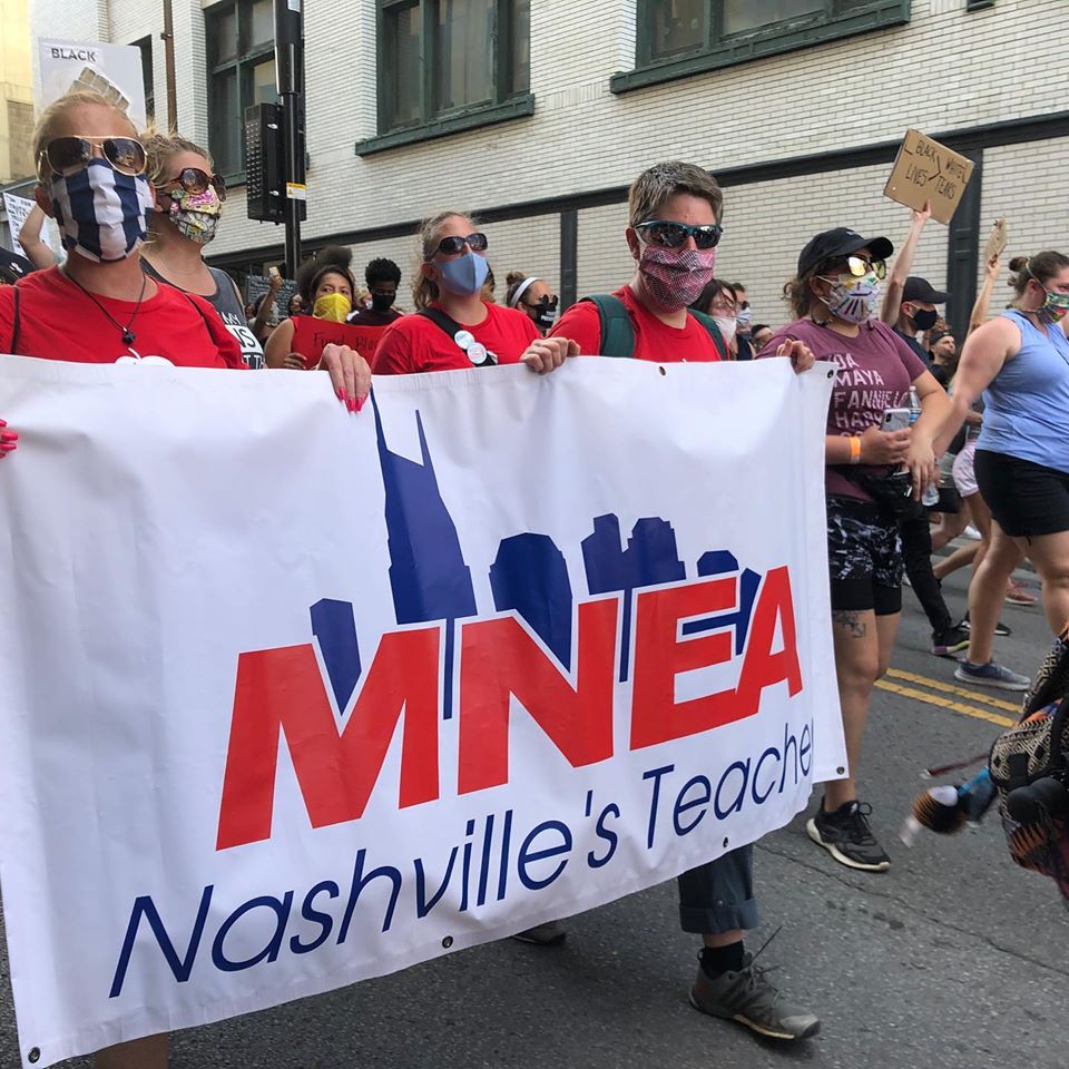 Members of MNEA in June protest downtown Nashvile. (Photo courtesy: facebook.com/MNEA.nashville)