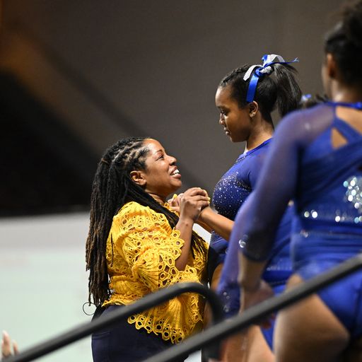 FIsk University Coach Tarver with gymnast Morgan Price