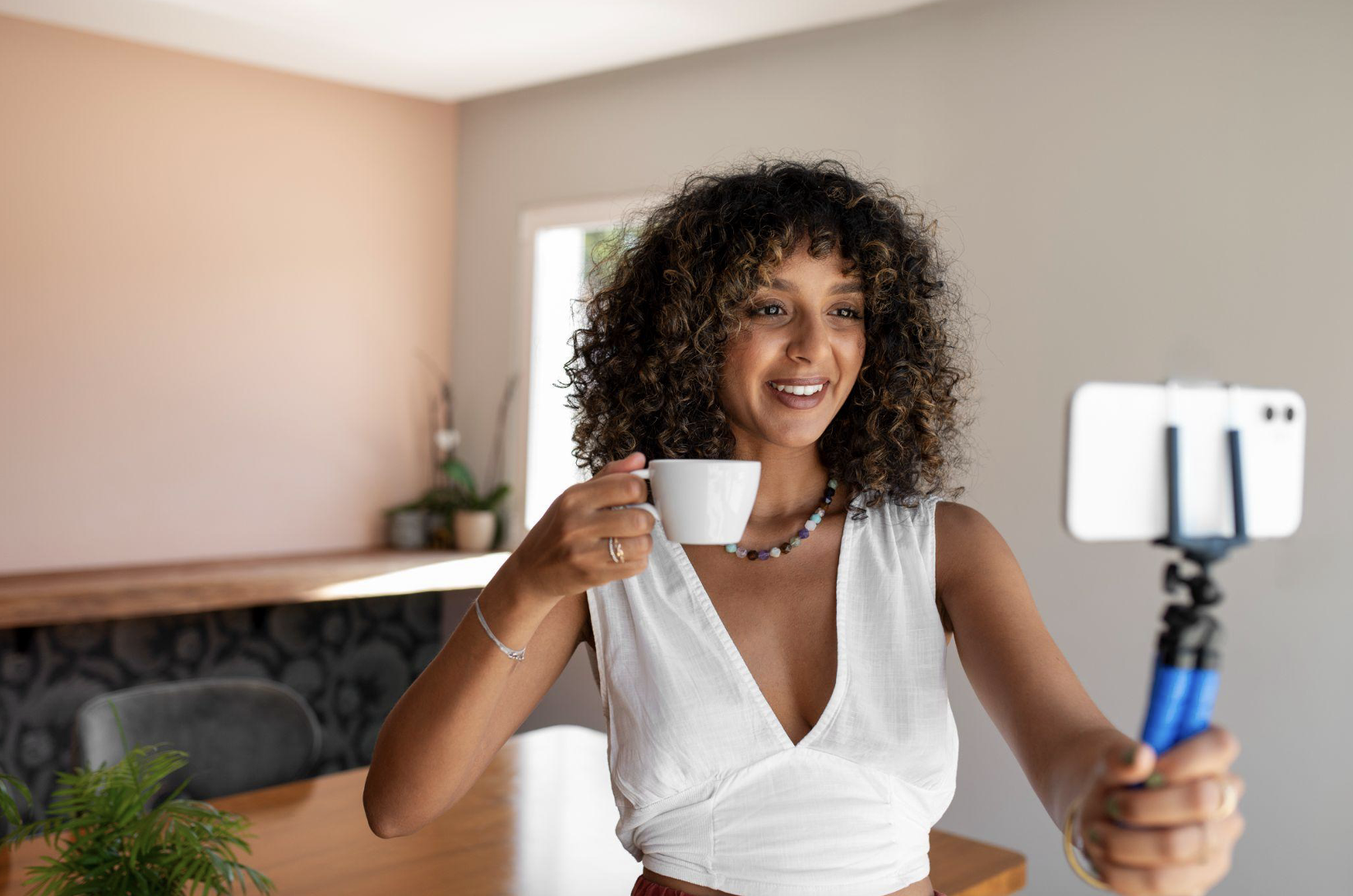 Woman streaming online on mobile device