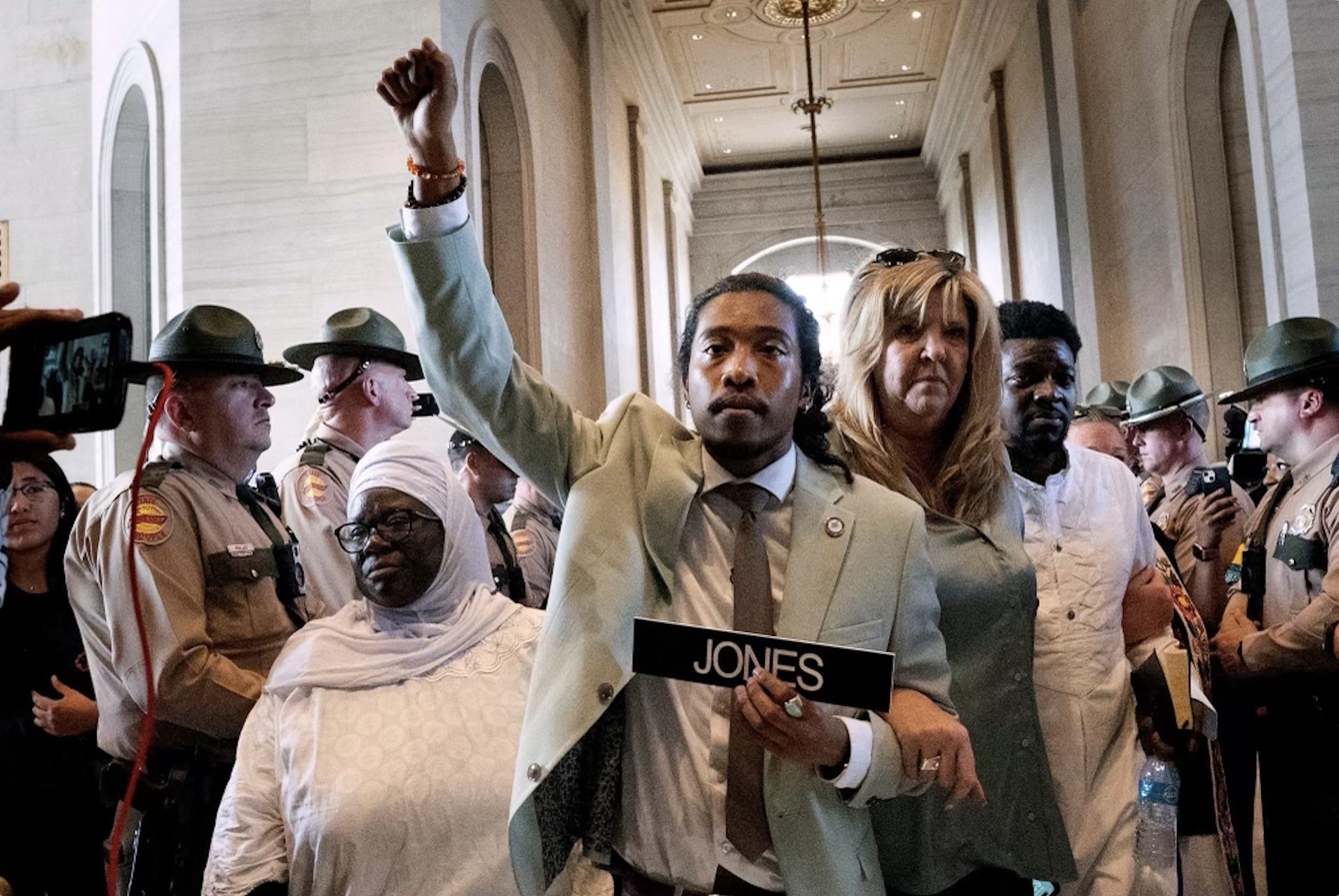 Rep. Justin Jones (Center) with Davidson County Council Member At Large Zulfat Suara (Left) and one of The Tennessee Three Rep. Gloria Johnson