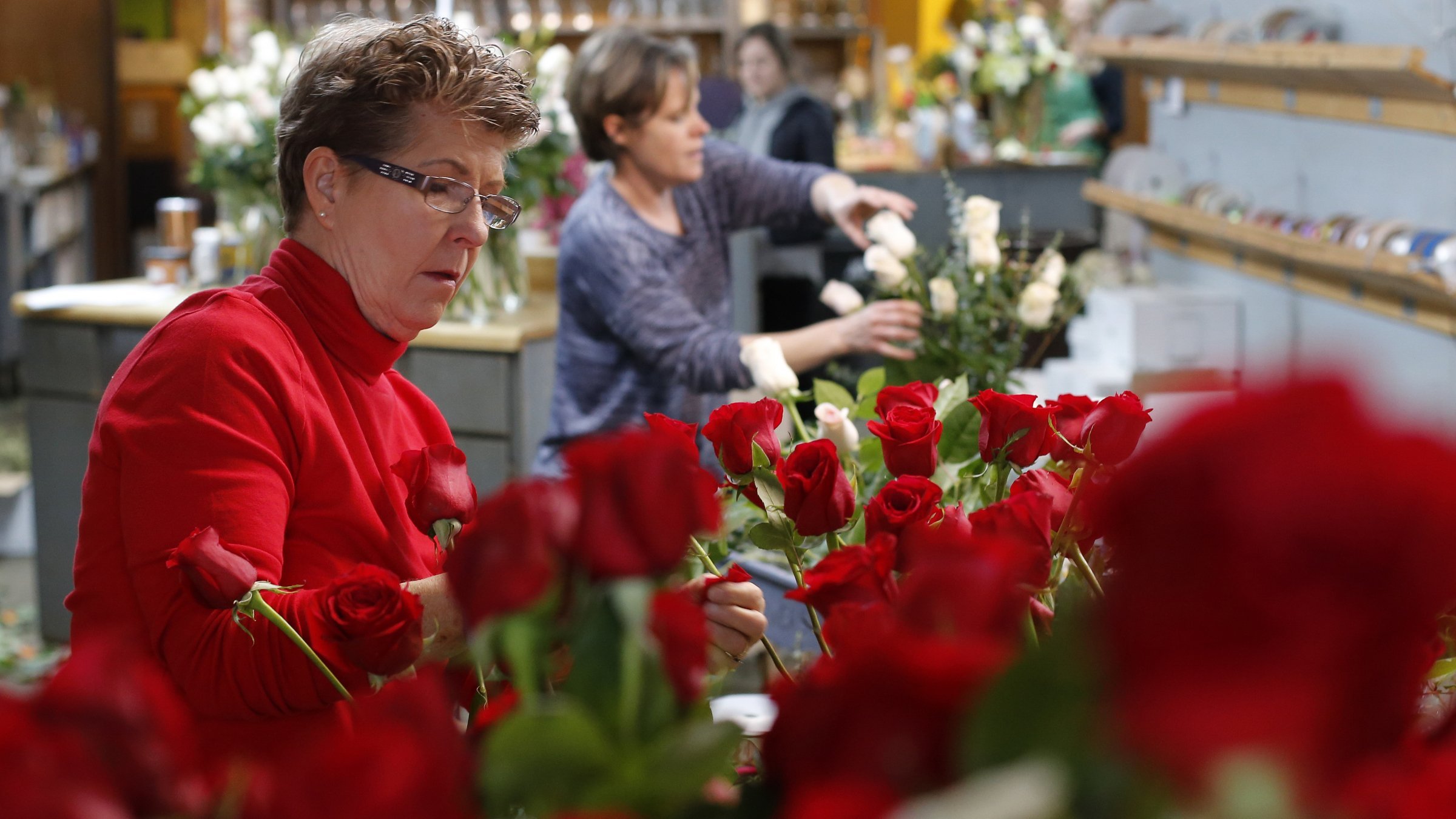 At Kroger, a dozen roses at stores usually cost around $10. During the Valentine's Day stretch, they go for double.