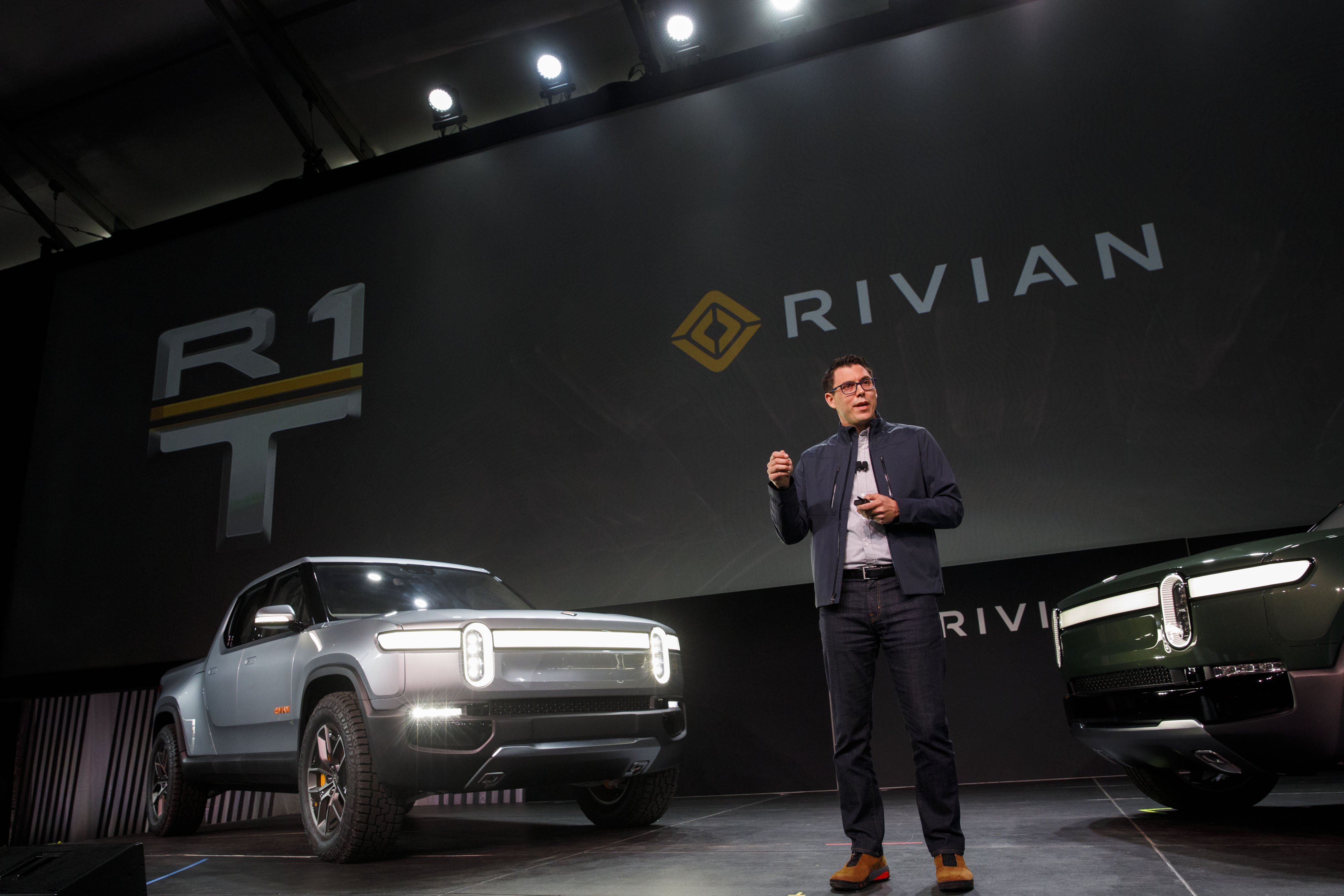 The online retailer led a $700 million investment in Michigan-based electric pickup maker Rivian, the companies said Friday.