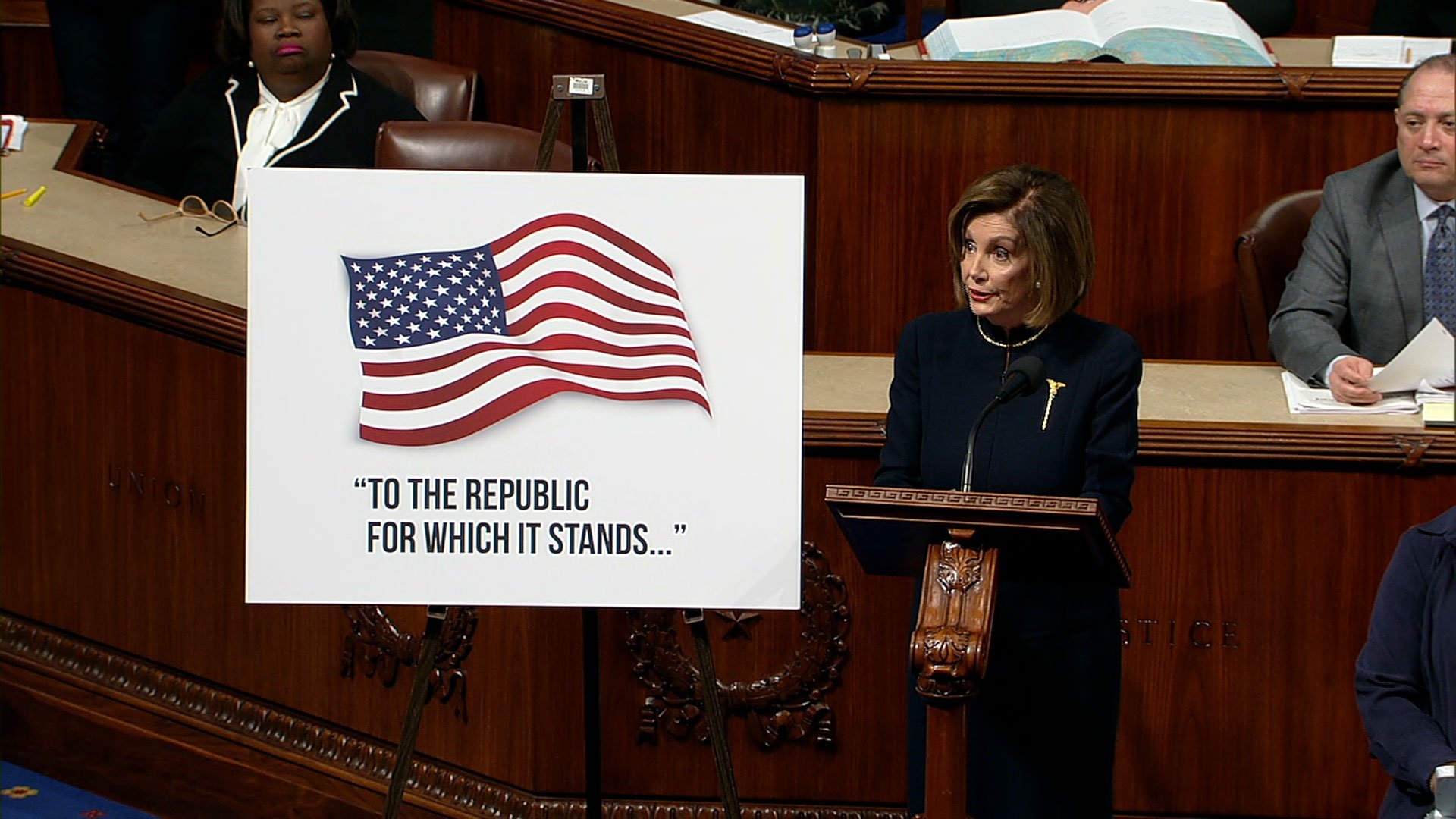 House Speaker Nancy Pelosi rebuked President Trump at the start of the debate on the articles of impeachment, calling him an "ongoing threat to our national security."