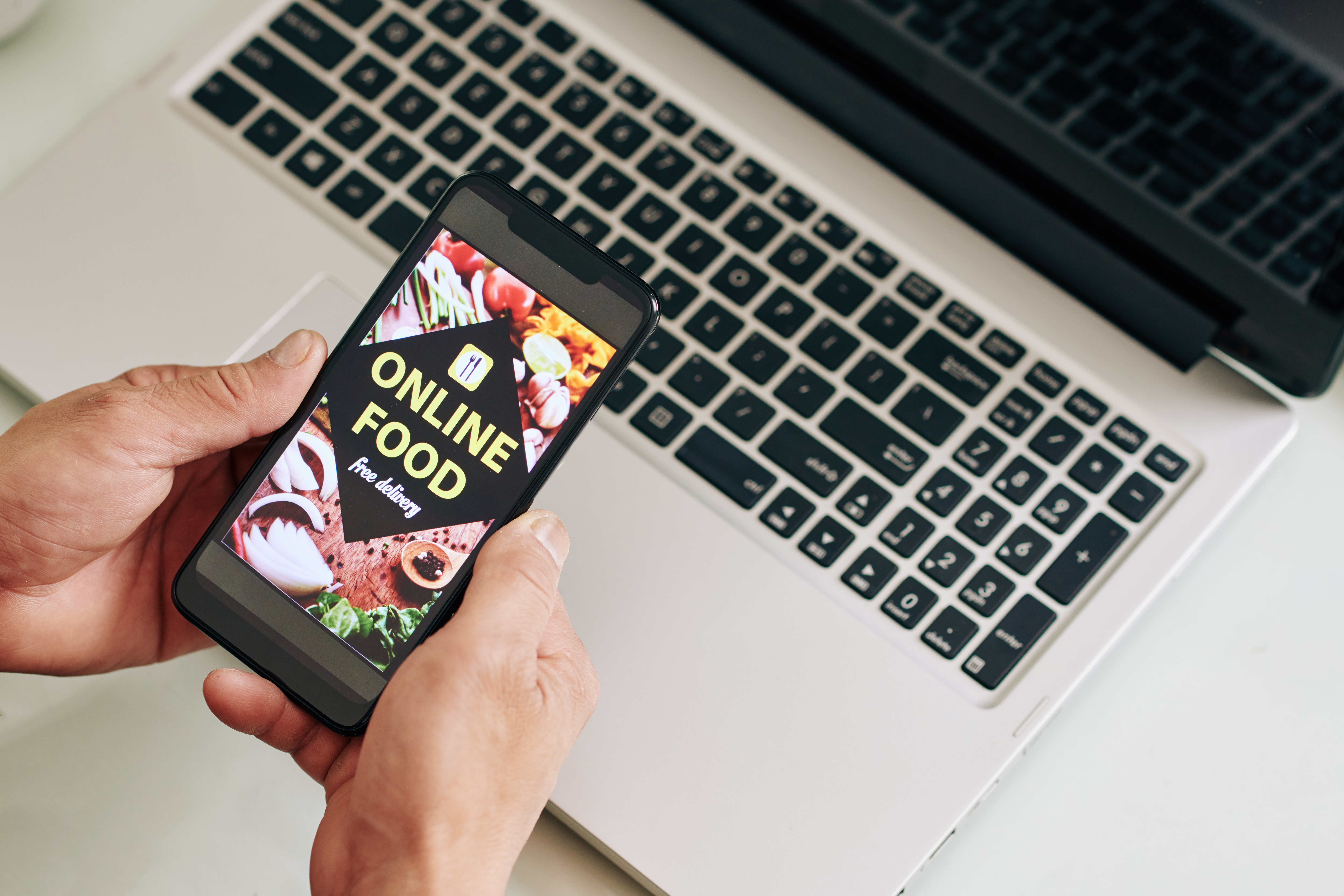 Businessman ordering meal delivery