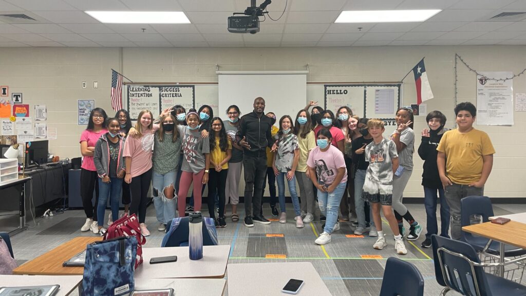 “When you look at those kids, you develop a place in your heart for all of them,” said Darwin Price (Center), a special education who overcame a troubled childhood to become a boxer, track star and entrepreneur. (Courtesy of Darwin Price)