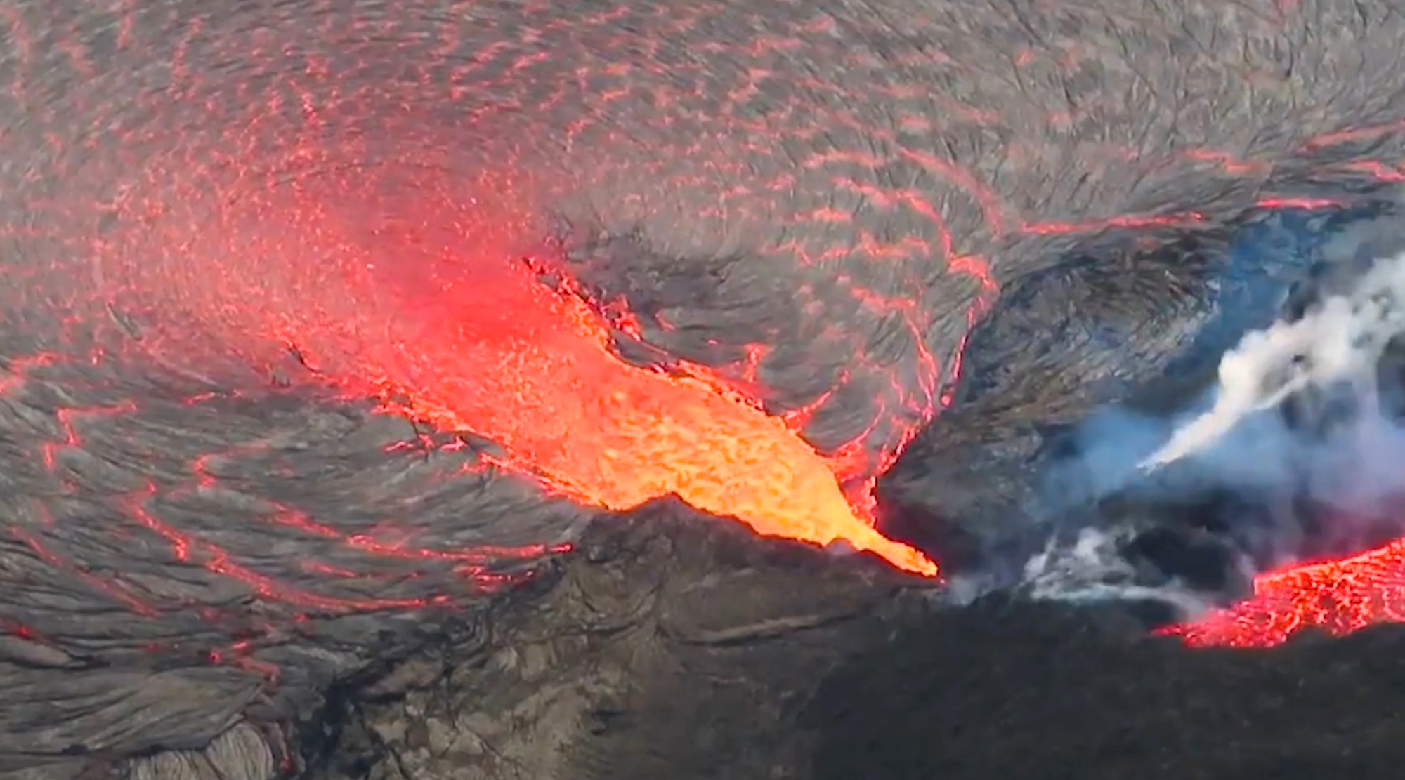 Lava flows from a vent in the western wall of the Kīlauea volcano's Halemaʻumaʻu crater on Oct. 29. (U.S. Geological Survey/Zenger)