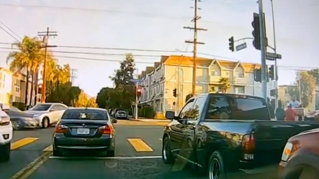 A Honda HRV that was hit by another vehicle, jumped the curb and landed on the sidewalk, killing a toddler in a stroller and injuring a nearby pedestrian, in the North Hills area of Los Angeles, California, on Oct. 17. (Los Angeles Police Department/Zenger)