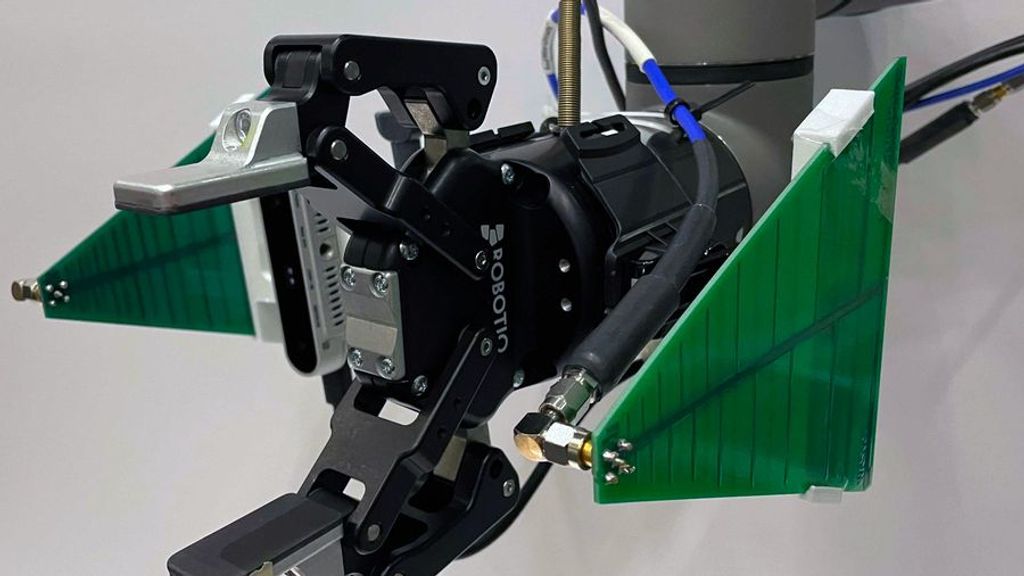 Researchers at MIT have developed a robotic arm that uses visual data from a camera and radio frequency (RF) information from an antenna to find and retrieve objects, even when they are buried under a pile and fully out of view. (Fadel Adib, Tara Boroushaki, et. al.)