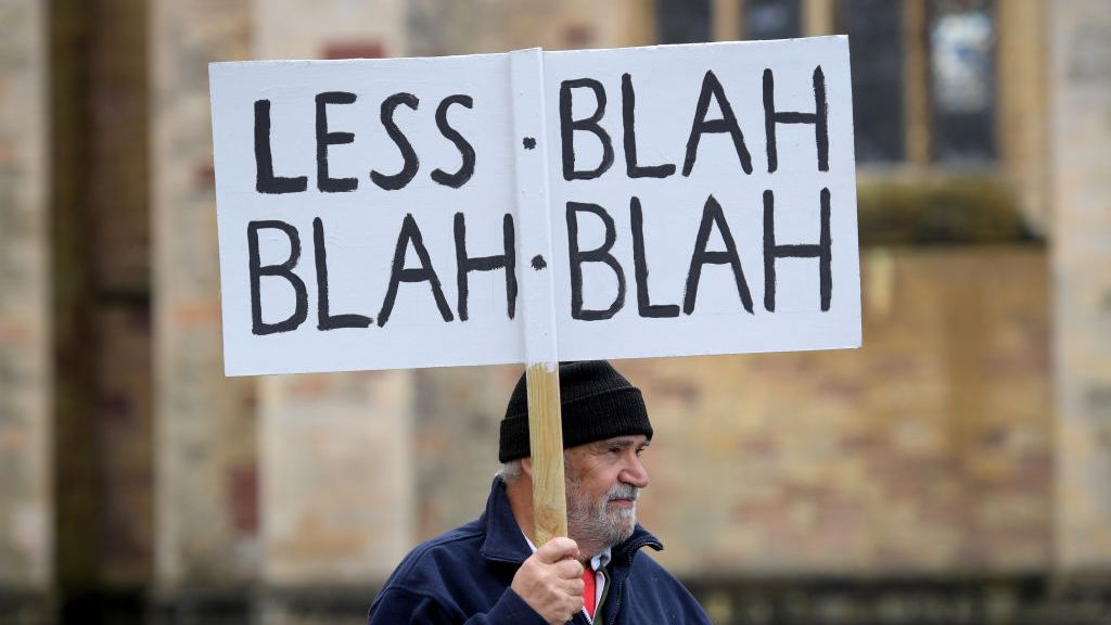 Protesters gather prior to a march on Nov. 6 in Bristol, England. Protest groups across the U.K. marched in solidarity with protesters in Glasgow, Scotland, who demonstrated at the COP26 Climate Summit, demanding that governments and businesses commit to climate solutions. (Finnbarr Webster/Getty Images)