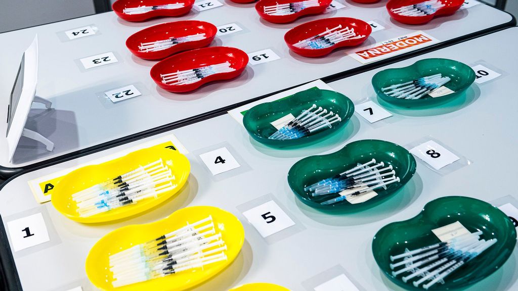 Syringes that contain the Moderna vaccine (red), the Pfizer/BioNTech vaccine (green) and the AstraZeneca vaccine (yellow) against Covid-19 at a mass vaccination center on July 1, 2021 in Leipzig, Germany. (Jens Schlueter/Getty Images)