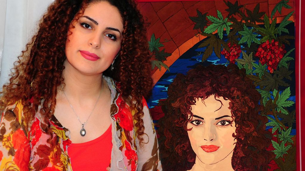 Iranian artist Ahad Saadi painted the woman of his dreams in 2009 — then he met Parisa Karamnezhad (pictured), who resembles the portrait. (Ahad Saadi/Zenger)