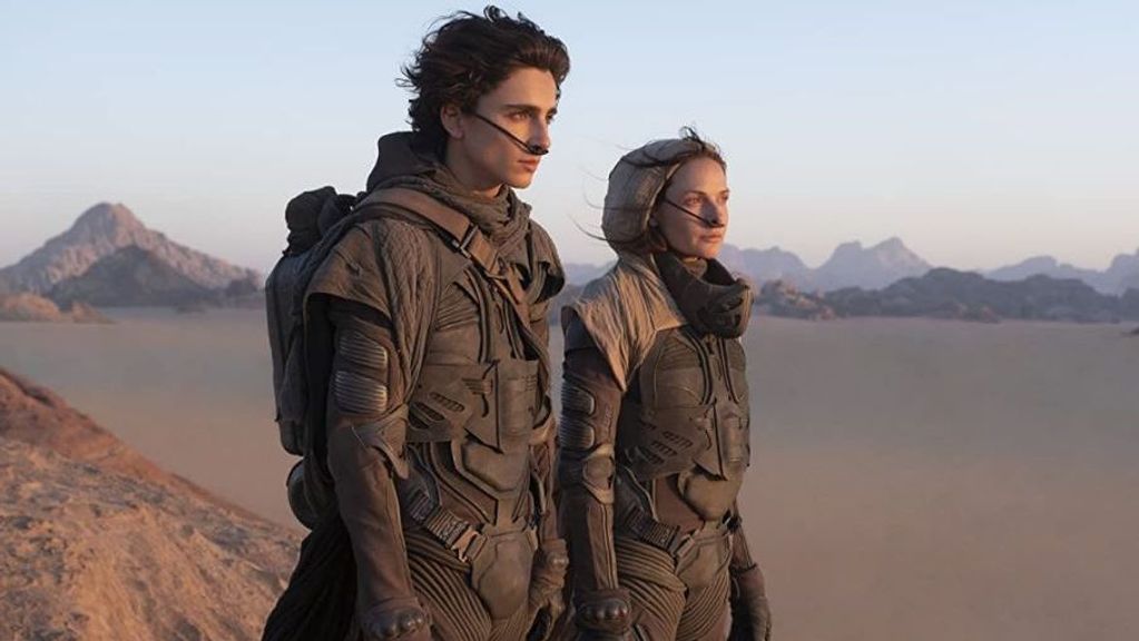 Paul (Timothée Chalamet) and Lady Jessica (Rebecca Ferguson) take control of the dangerous desert planet Arrakis in “Dune.” (Warner Bros.)