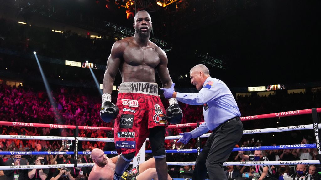 Trainer Malik Scott believes ex-title holder Deontay Wilder (foreground) broke his right hand while flooring WBC heavyweight champion Tyson Fury twice in the fourth round of his 11th-round TKO loss on Oct. 9. Wilder had surgery on Oct. 18 to repair the damage. (Premier Boxing Champions)  