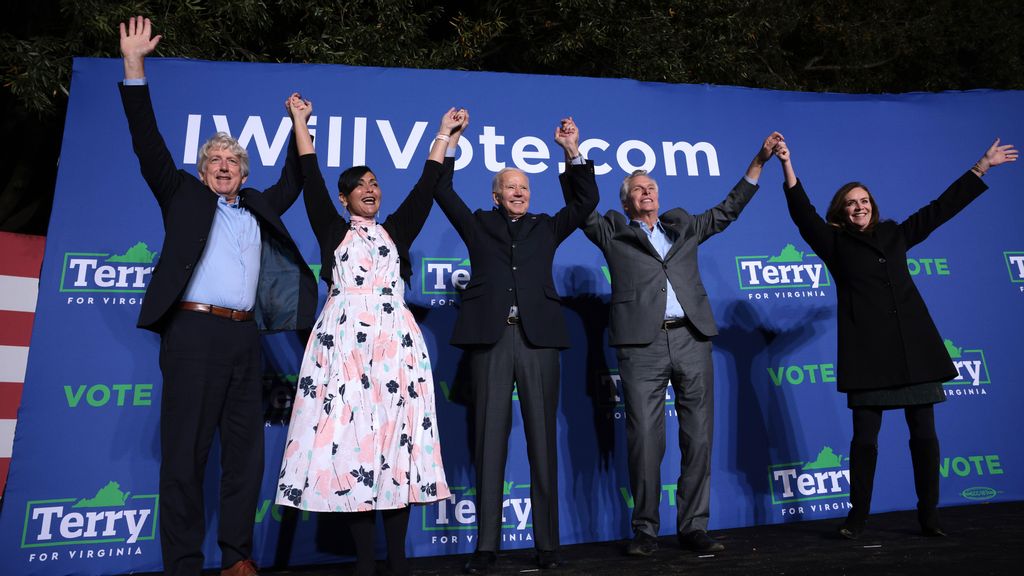 From left to right:  Attorney General Mark Herring, Democratic Lt. candidate Hala Ayala, President Joe Biden, Democratic gubernatorial candidate Terry McAuliffe, and his wife Dorothy McAuliffe on a campaign stop in Arlington, Virginia on October 26, 2021. (Win McNamee/Getty Images) 
