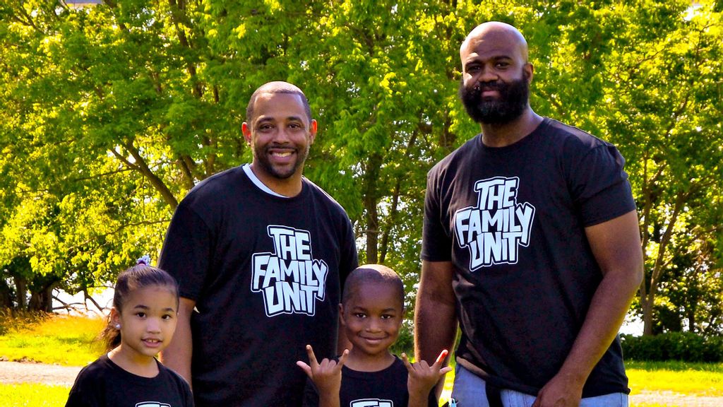 “The Family Unit” clothing line co-creators Roy Williams Jr. (above, second from left) and Xavier Elder-Henson (right) with Ariella Williams and Cameron Elder-Henson, are “black fathers trying to build a legacy for their children,” said Xavier Elder-Henson. (Courtesy of Roy Williams Jr.)