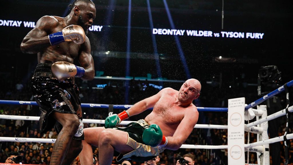 Deontay Wilder (left) twice floored lineal champion Tyson Fury in their first bout in December 2018, retaining his WBC heavyweight title via a split-decision draw. Fury twice floored and eventually dethroned Wilder in their February 2020 rematch. They clash a third time on Oct. 9. (Ester Lin/Showtime)  