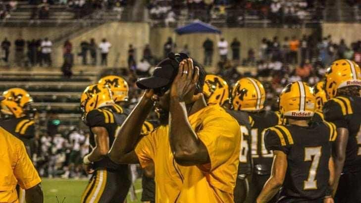 Marcus Washington working the sidelines as a coach at his alma mater, Fort Bend Marshall High School in Texas. (Courtesy of Marcus Washington)