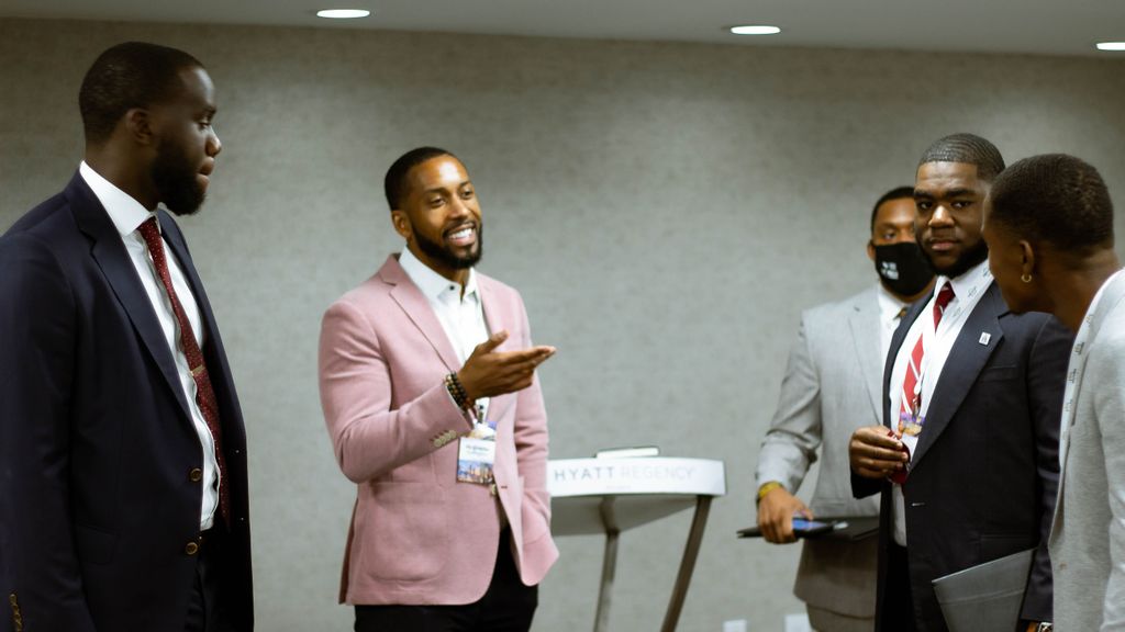 Marvel Joseph (left) and Johnathan Quarles encourage students to appreciate future relations with Israel, at a summit organized by the Maccabee Task Force in Atlanta. (Christopher François) 