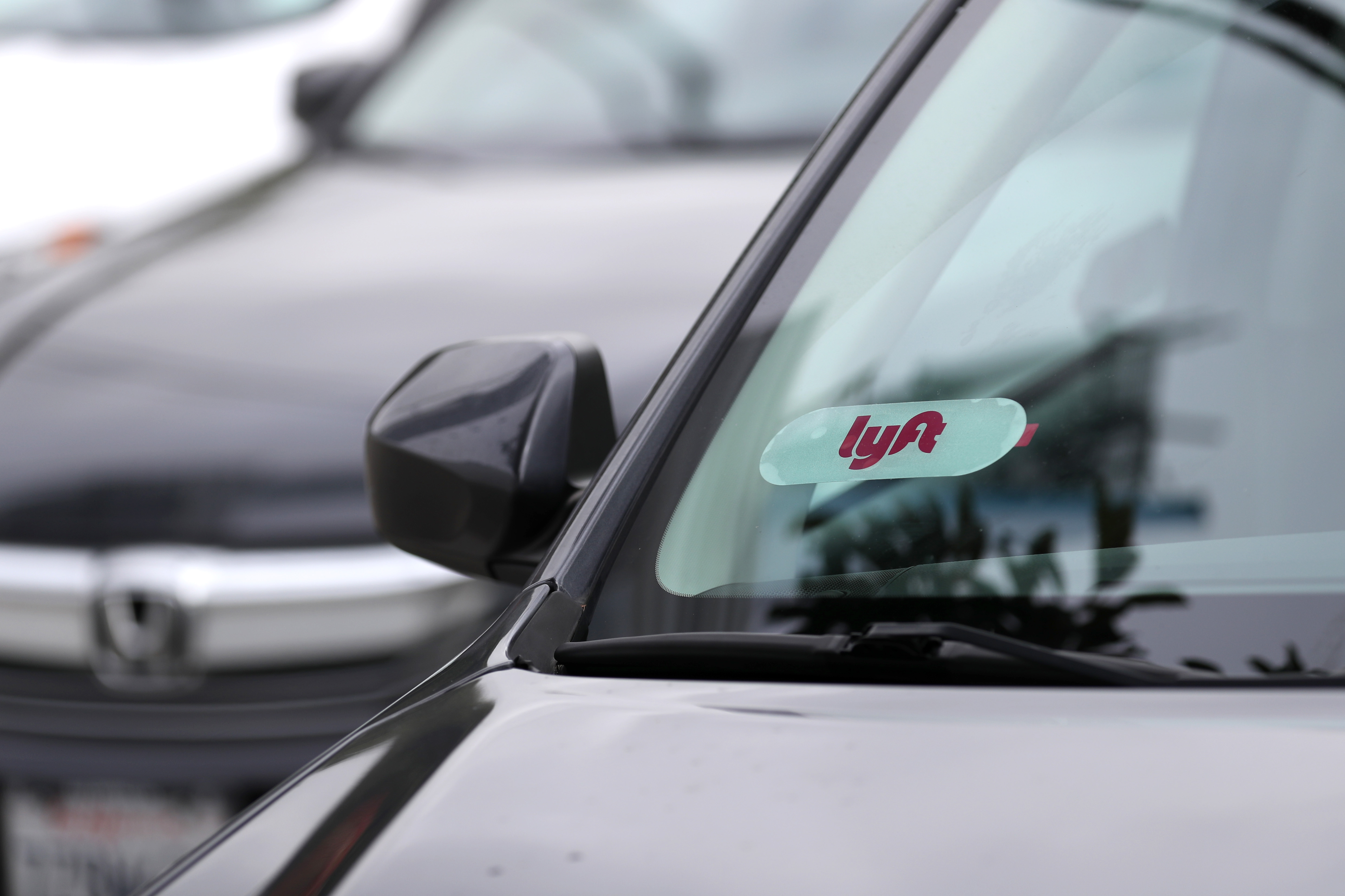Lyft has spent years battling Uber in the ride-hailing market. Now, it's taking on Hertz and Avis, too.