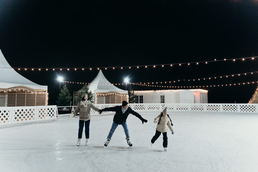 A family ice skating.