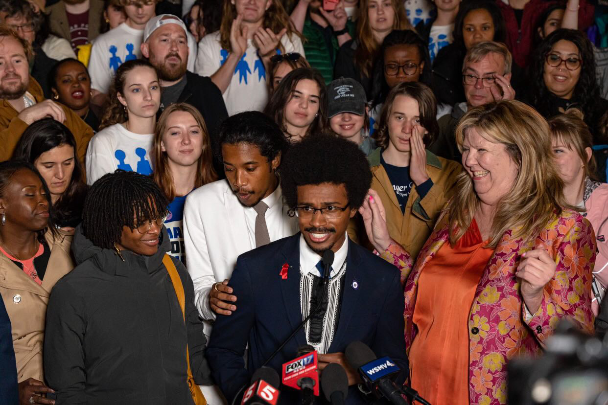 Rep. Justin Pearson (center) speaking as Rep. Justin Jones approaches the microphone