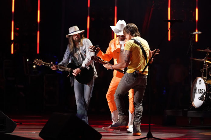 Lil Nas X, Billy Ray Cyrus and Keith Urban Lil Nas X, Billy Ray Cyrus and Keith Urban surprise CMA Fest attendees with an epic performance of “Old Town Road” at Nissan Stadium in Nashville Saturday, June 8. (Photo Credit: Donn Jones/CMA)